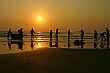 Everyone chips in to prepare the fishing nets early in the morning; Mui Ne, Vietnam
